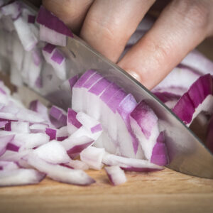 Cutting a red onion